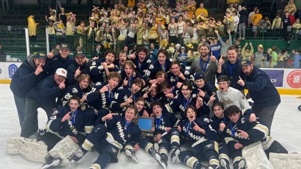 Chanhassen Storm celebrate the Section 2AA championship over previously unbeaten Minnetonka.